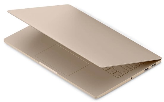 Ноутбук Xiaomi Mi Notebook Air 12.5" (Intel Core m3 7Y30 1000 MHz/1920x1080/4Gb/128Gb SSD/Intel HD Graphics 615/Wi-Fi/Bluetooth/Win10 Home RUS) gold фото 2